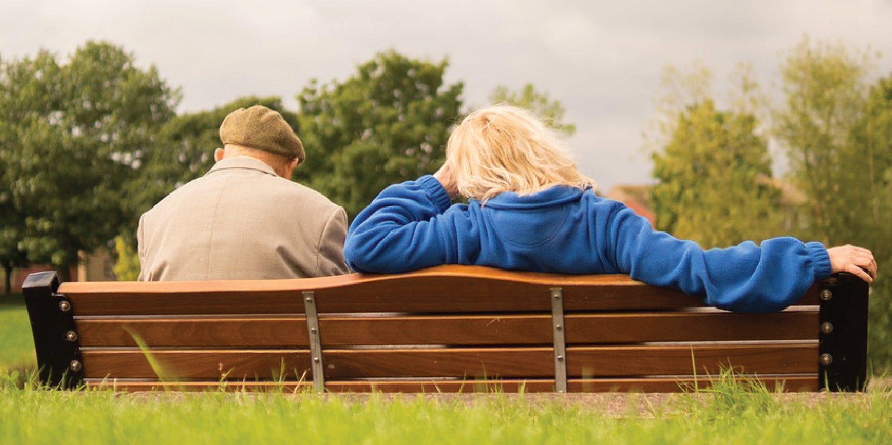 Couple Resting on Bench